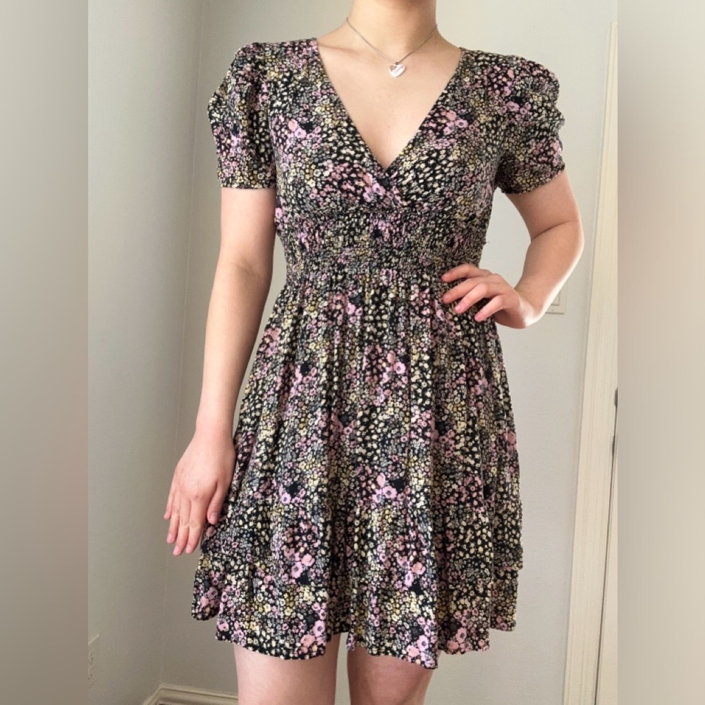 Black floral sundress with ruffle detail bottom
